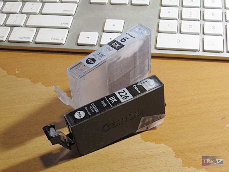 Canon Ink Tanks, old and new.